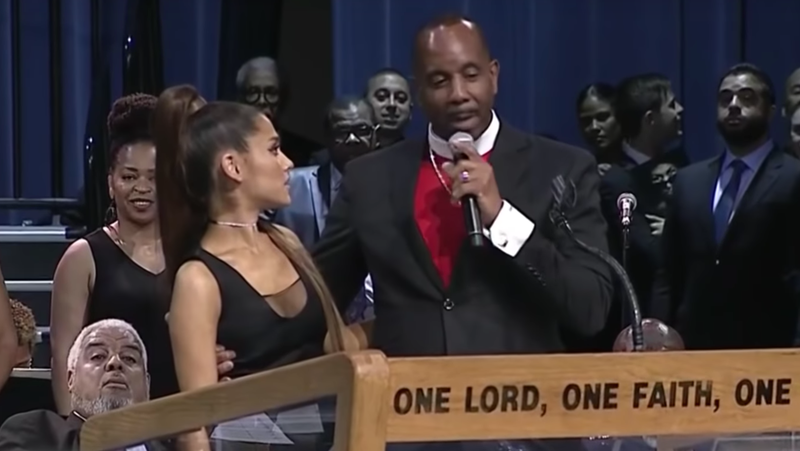 Illustration for article titled The Bishop Who Groped Ariana Grande During Aretha Franklin's Funeral Says He's Guilty of Being 'Too Friendly'